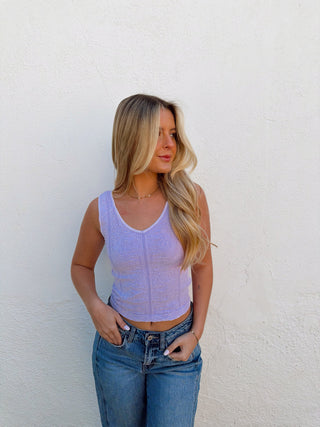 Woman modeling a lavender tank
