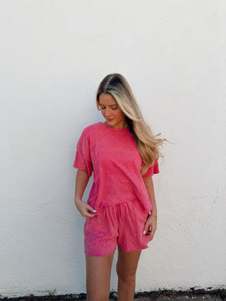 Woman modeling a pink set