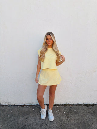 Woman modeling a yellow set