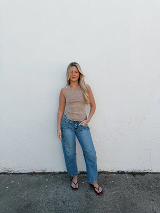 Woman modeling a mocha tank