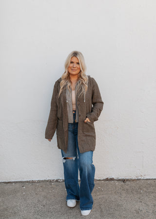 Standing On Business Coat