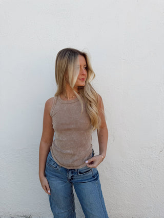 Woman modeling a mocha tank