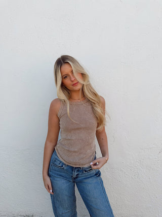 Woman modeling a mocha tank