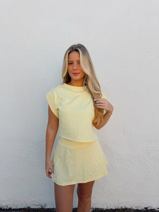 Woman modeling a yellow set