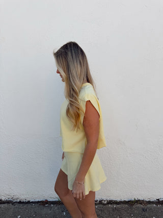 Woman modeling a yellow set