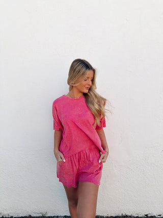 Woman modeling a pink set