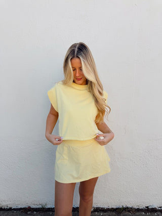 Woman modeling a yellow set