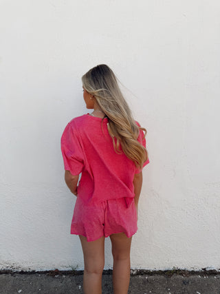 Woman modeling a pink set