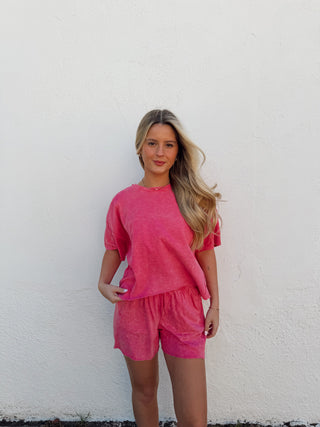 Woman modeling a pink set