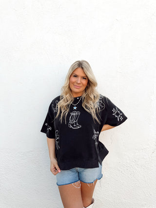 woman wearing a western graphic tee